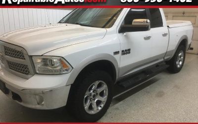 Photo of a 2013 RAM 1500 Laramie Quad Cab 4WD Repairable Rear Damage for sale