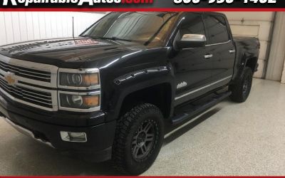Photo of a 2015 Chevrolet Silverado 1500 High Country Crew Cab 4WD Repairable Rear Damage for sale