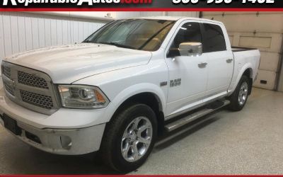 Photo of a 2015 RAM 1500 Laramie Crew Cab 4WD Repairable Hail Damage for sale