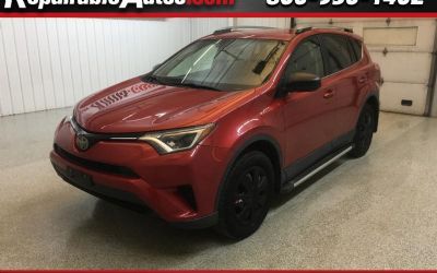 Photo of a 2017 Toyota RAV4 LE AWD Repairable Hail Damage for sale
