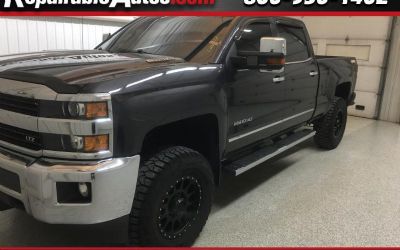 Photo of a 2016 Chevrolet Silverado 2500HD LTZ Crew Cab 4WD Repaired Theft Damage for sale