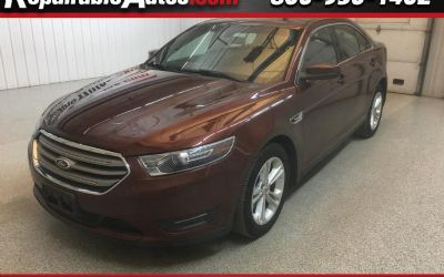 Photo of a 2015 Ford Taurus SEL Repaired Theft Damage for sale