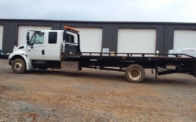 Photo of a 2005 International 4300 DT466 EXT. Cab Rollback Truck for sale